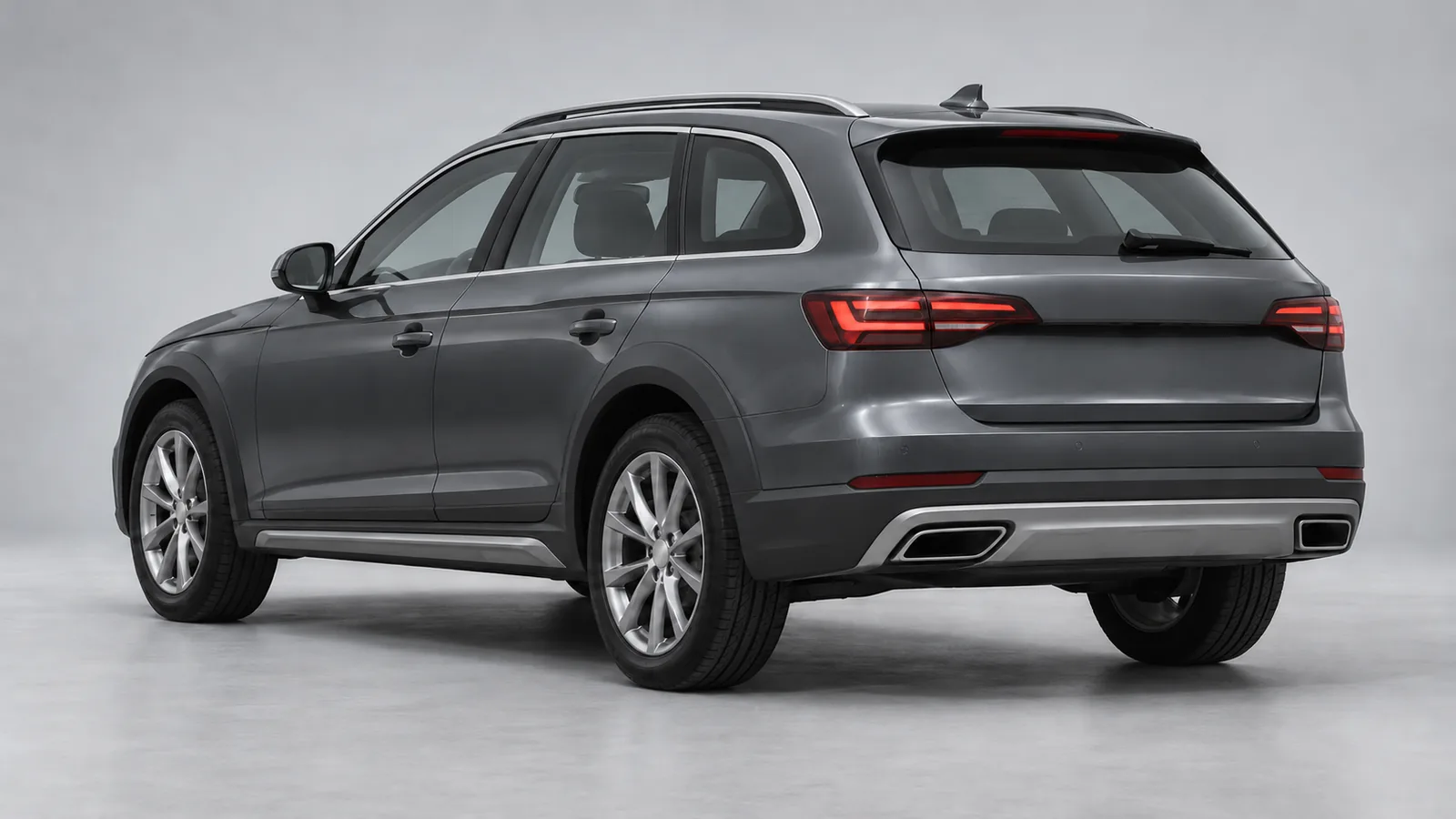 Illustrative unbranded graphite premium crossover photographed in a neutral grey automotive studio