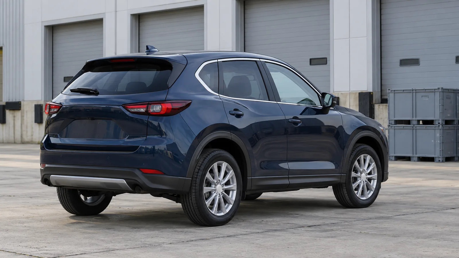 AI-generated illustration of a generic unbranded blue crossover beside a components warehouse, not a Mazda CX-5 or an actual Yazaki facility