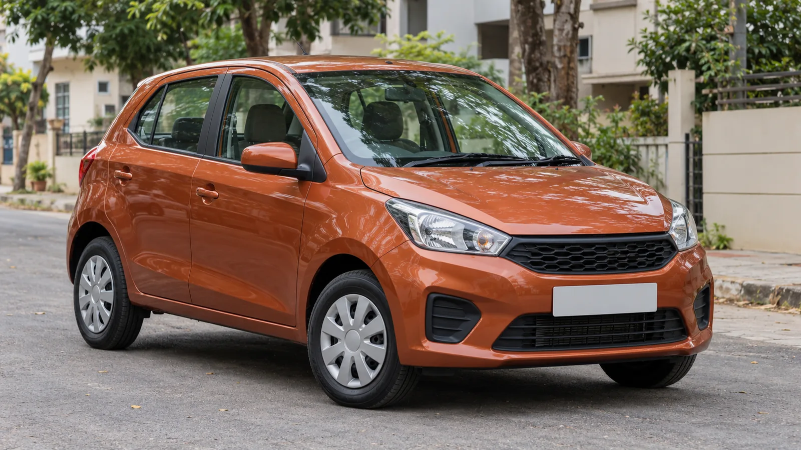 Illustrative unbranded burnt-orange compact hatchback parked on a quiet Indian residential street