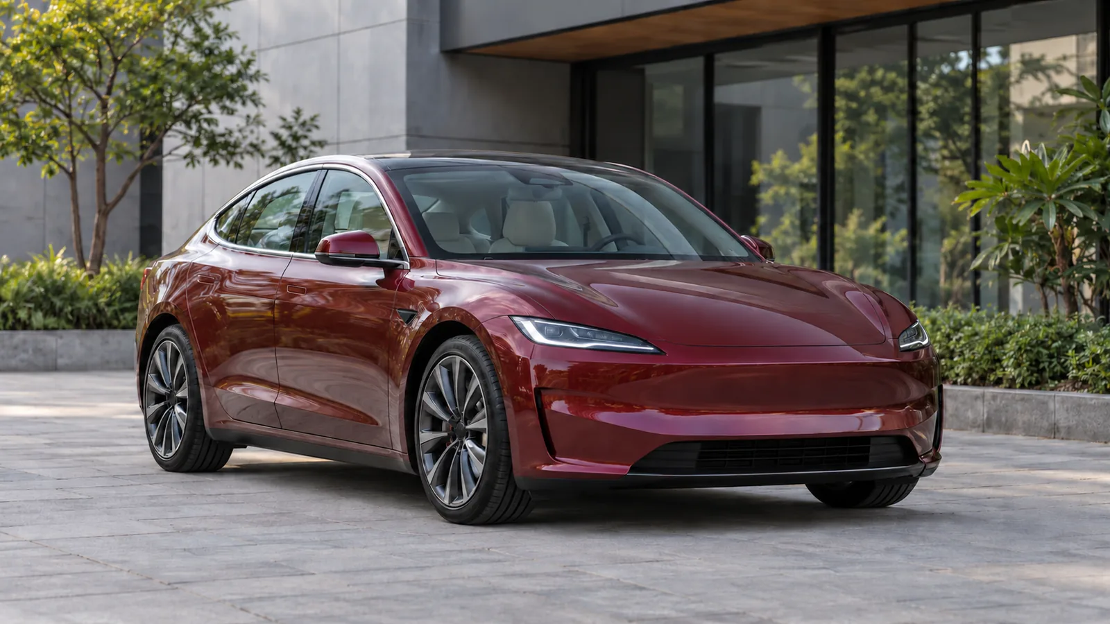 AI-generated illustration of a generic unbranded burgundy electric sedan outside an Indian commercial building, not an actual Tesla model or official design